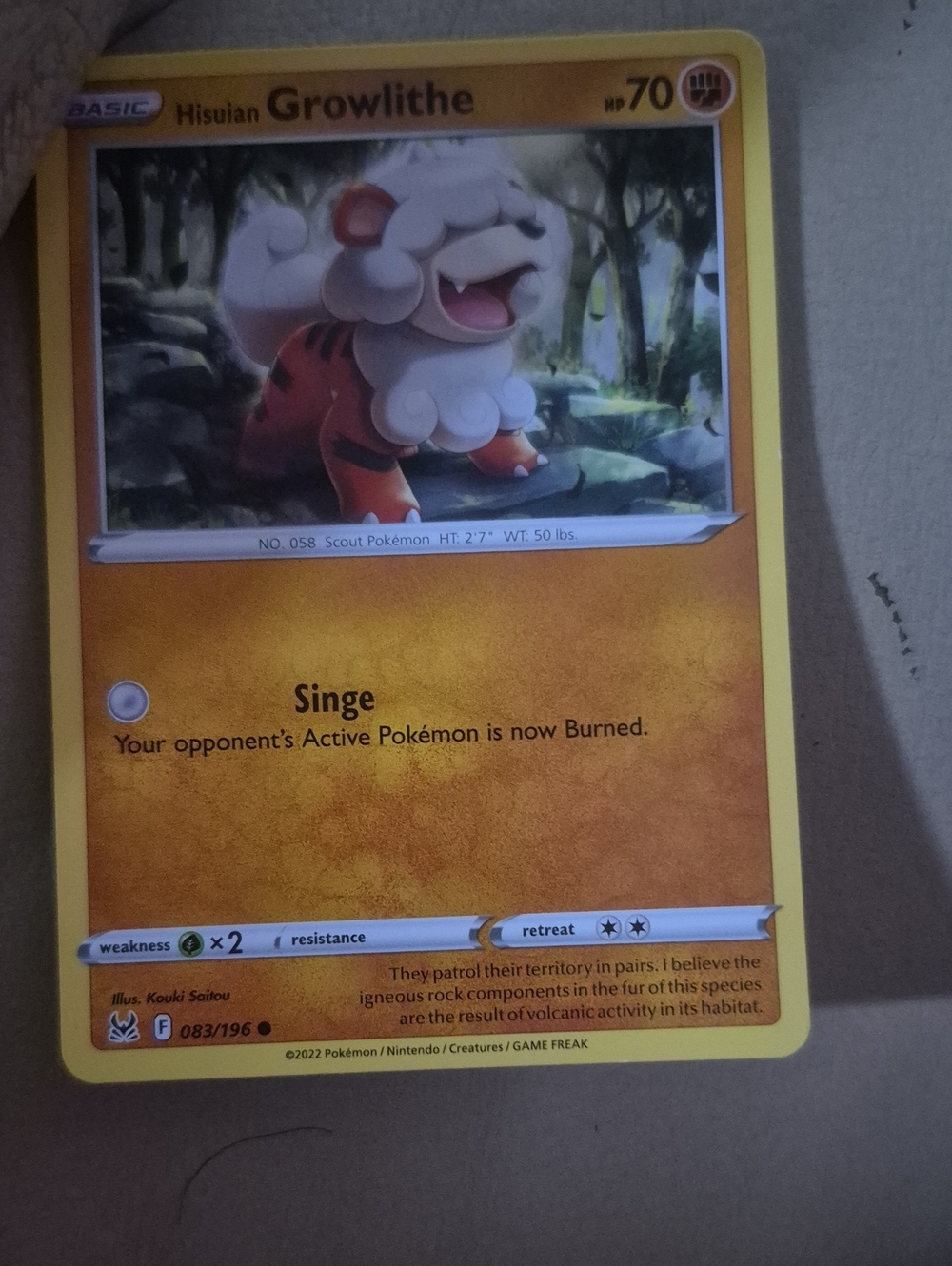 NEW--Hisuian Growlithe Pokémon Card - Yellow/Orange